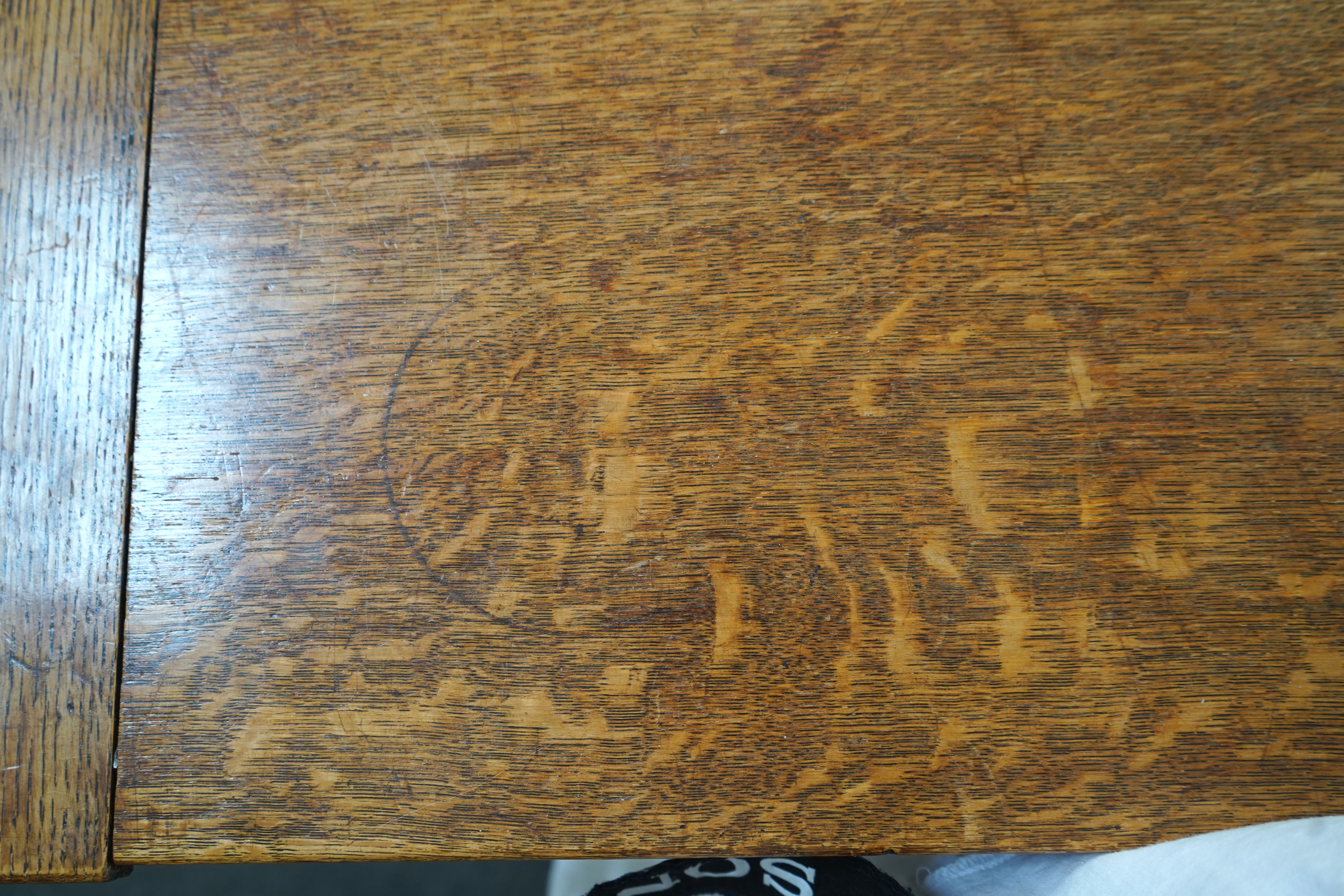 An Arts and Crafts oak refectory dining table